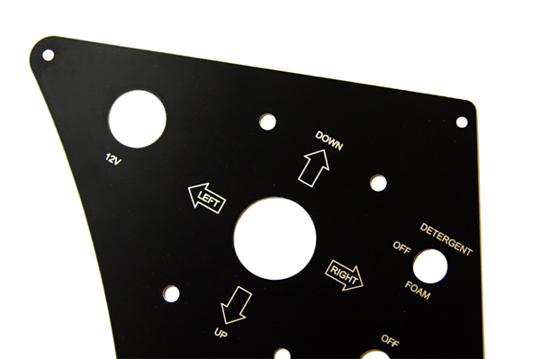 Coated aluminium control panel that has been laser cut and laser engraved.